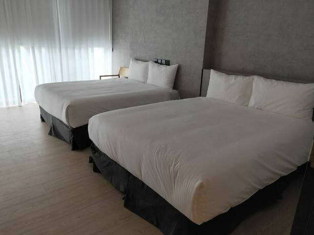 Imagen de la habitación del Hotel Comin' Place. Foto 12