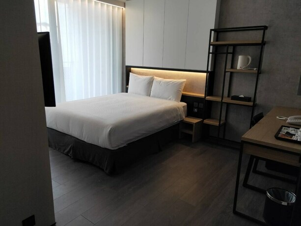 Imagen de la habitación del Hotel Comin' Place. Foto 13