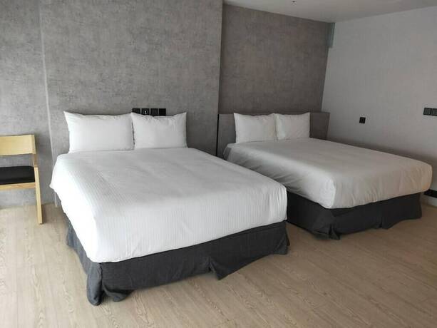 Imagen de la habitación del Hotel Comin' Place. Foto 14