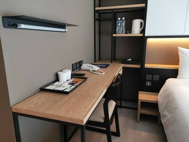 Imagen de la habitación del Hotel Comin' Place. Foto 16