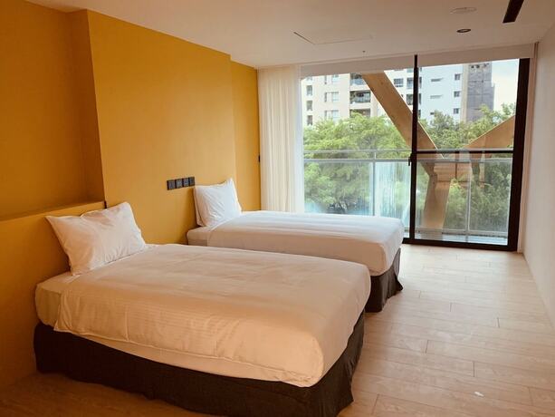 Imagen de la habitación del Hotel Comin' Place. Foto 20