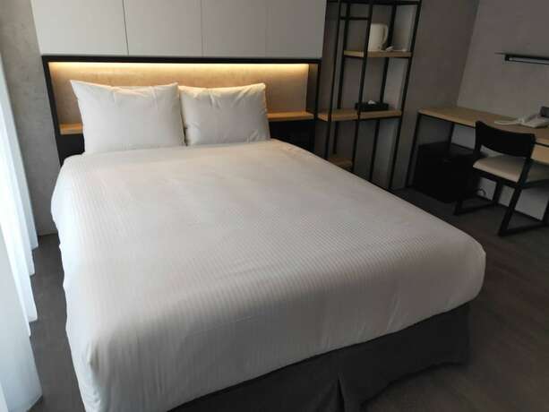 Imagen de la habitación del Hotel Comin' Place. Foto 21