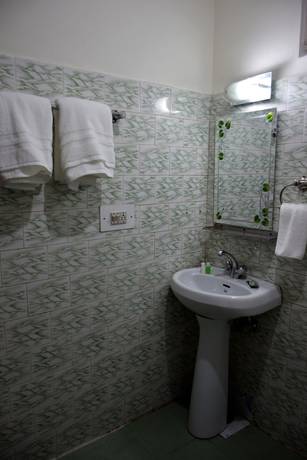 Imagen de la habitación del Hotel Comlux, Manali. Foto 6