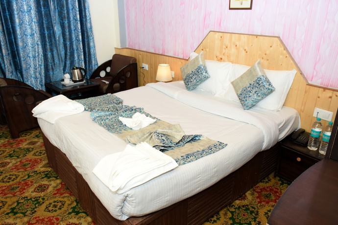 Imagen de la habitación del Hotel Comlux, Manali. Foto 7