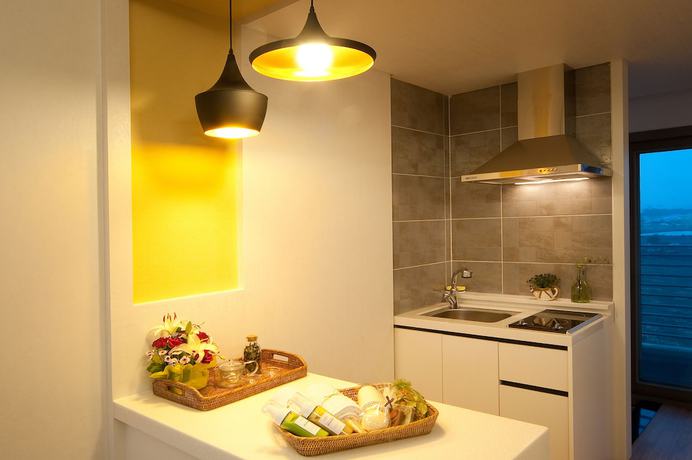 Imagen de la habitación del Hotel Comma and Resort. Foto 10