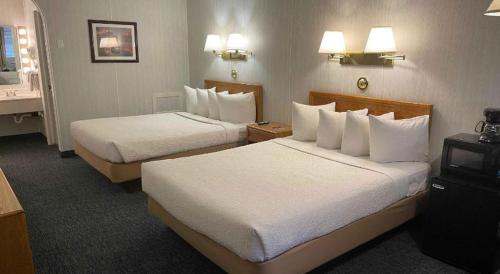 Imagen de la habitación del Hotel Commack Inn. Foto 15