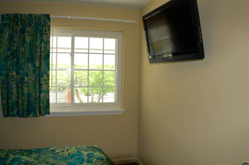 Imagen de la habitación del Hotel Commander Beach House. Foto 16