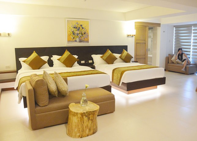 Imagen de la habitación del Hotel Commander Suites De Boracay. Foto 11