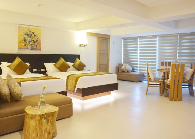 Imagen de la habitación del Hotel Commander Suites De Boracay. Foto 12