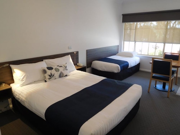 Imagen de la habitación del Hotel Commercial Golf Resort. Foto 6