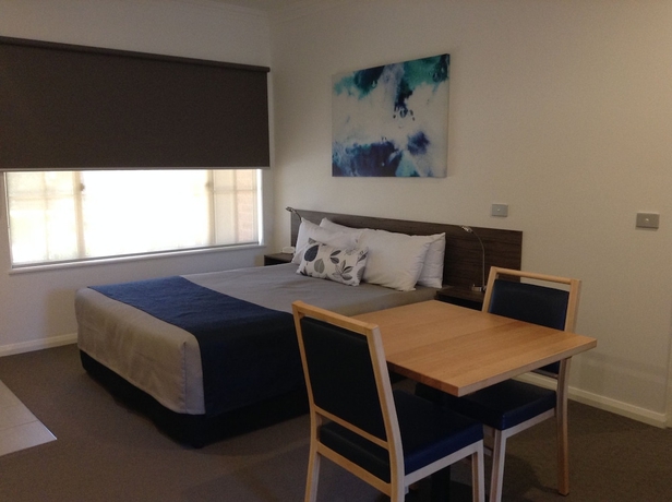 Imagen de la habitación del Hotel Commercial Golf Resort. Foto 11