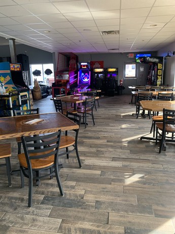 Imagen del bar/restaurante del Hotel Commodore Perry Inn And Suites. Foto 3