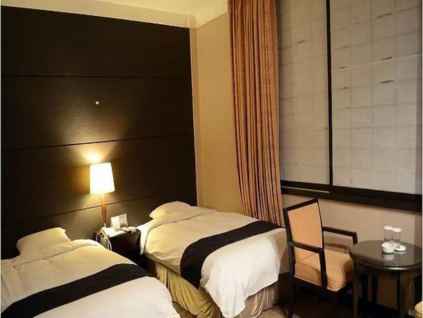 Imagen de la habitación del Hotel Commodore Pohang. Foto 9