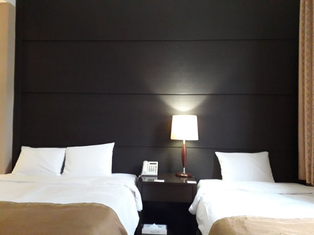 Imagen de la habitación del Hotel Commodore Pohang. Foto 13