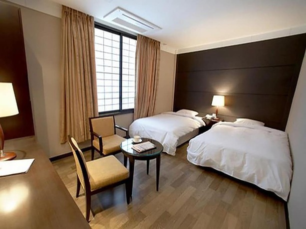 Imagen de la habitación del Hotel Commodore Pohang. Foto 14