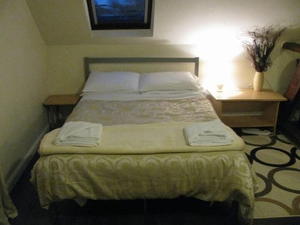 Imagen de la habitación del Hotel Common Farm Motel. Foto 11