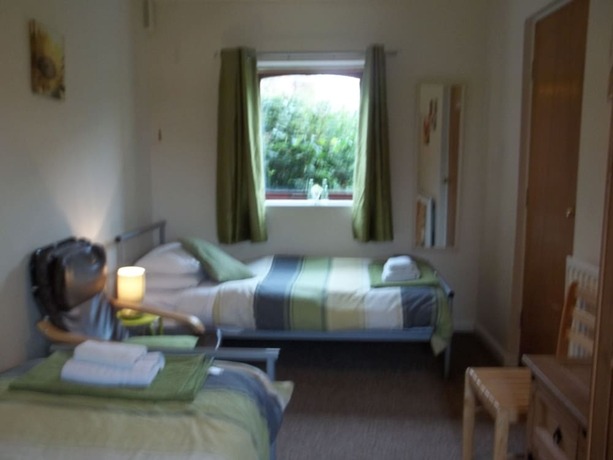 Imagen de la habitación del Hotel Common Farm Motel. Foto 12