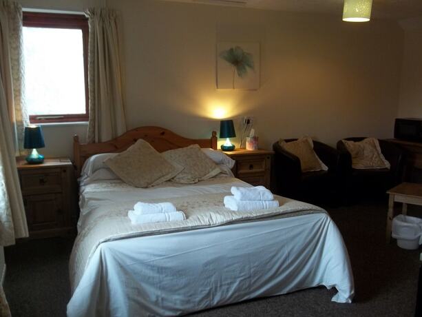 Imagen de la habitación del Hotel Common Farm Motel. Foto 14