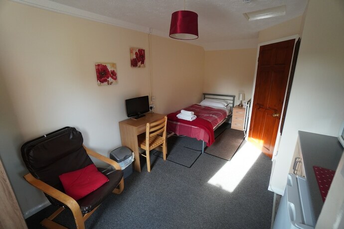 Imagen de la habitación del Hotel Common Farm Motel. Foto 15