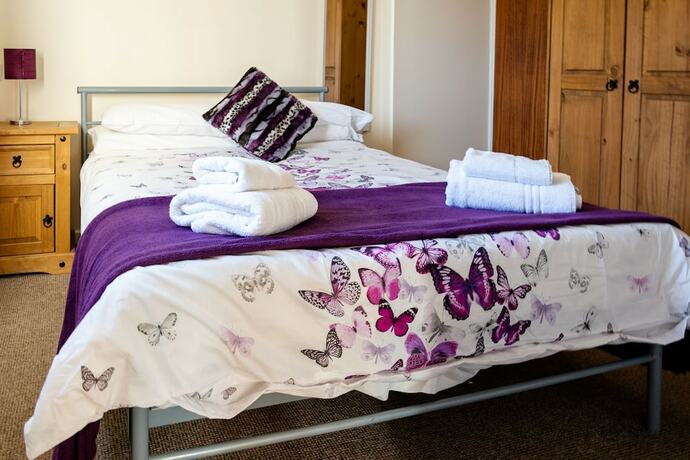 Imagen de la habitación del Hotel Common Farm Motel. Foto 18