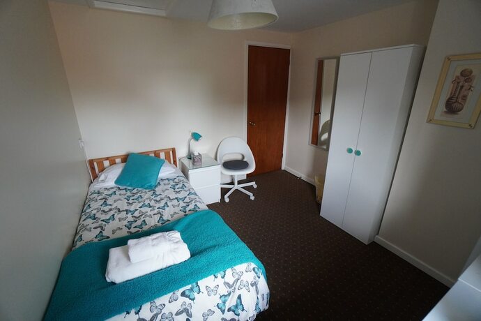 Imagen de la habitación del Hotel Common Farm Motel. Foto 19