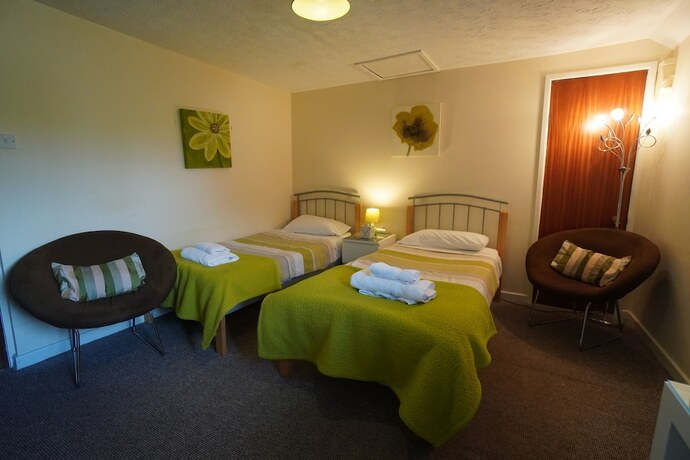 Imagen de la habitación del Hotel Common Farm Motel. Foto 20