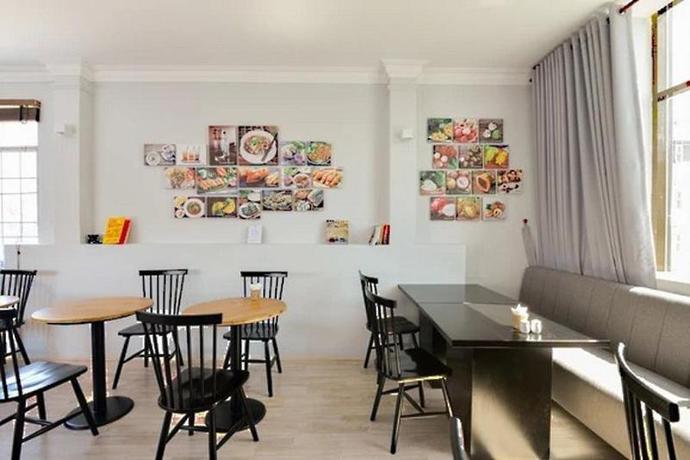 Imagen del bar/restaurante del Hotel Common Inn Ben Thanh. Foto 4