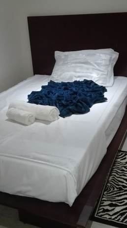 Imagen de la habitación del Hotel Commonlens Inn.. Foto 7