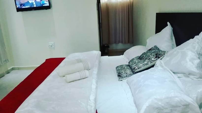 Imagen de la habitación del Hotel Commonlens Inn.. Foto 8
