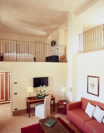 Imagen de la habitación del Hotel Como Castello Del Nero. Foto 4