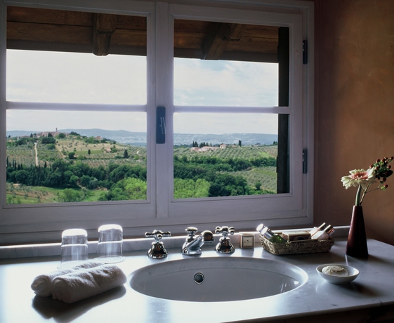 Imagen de la habitación del Hotel Como Castello Del Nero. Foto 5