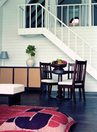 Imagen de la habitación del Hotel Como Cocoa Island. Foto 4