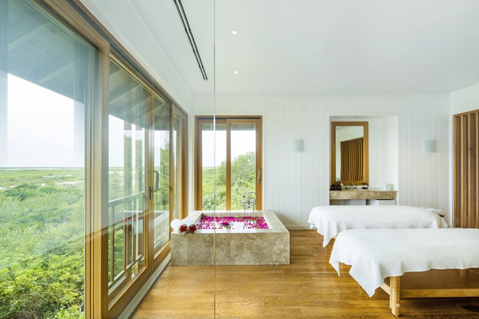 Imagen de la piscina del Hotel Como Parrot Cay. Foto 16