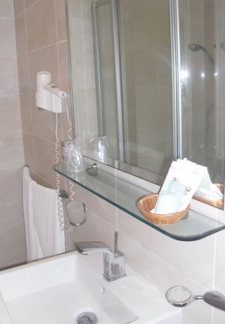 Imagen de la habitación del Hotel Como, Siracusa. Foto 4