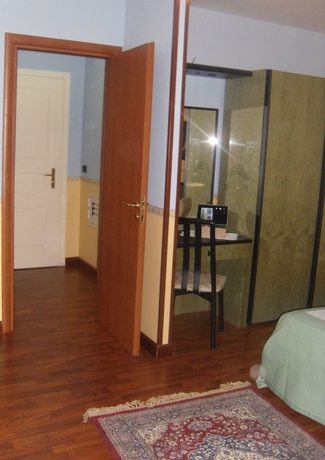 Imagen de la habitación del Hotel Como, Siracusa. Foto 12