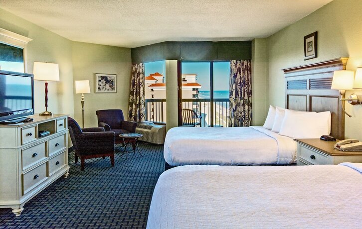 Imagen de la habitación del Hotel Compass Cove Resort. Foto 11