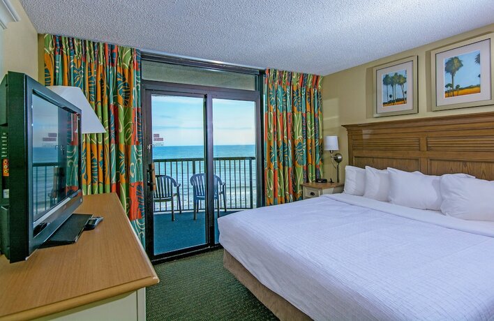 Imagen de la habitación del Hotel Compass Cove Resort. Foto 16