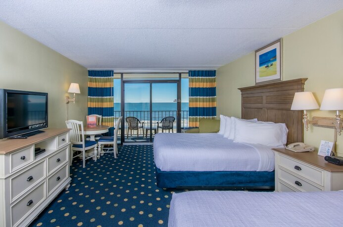 Imagen de la habitación del Hotel Compass Cove Resort. Foto 19