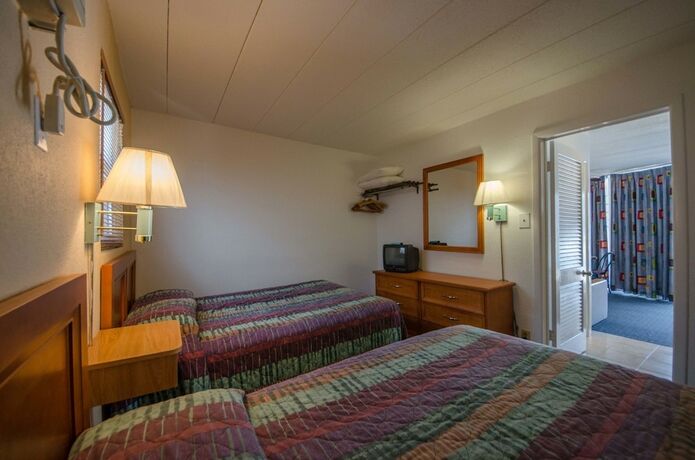 Imagen de la habitación del Hotel Compass Family Resort. Foto 17