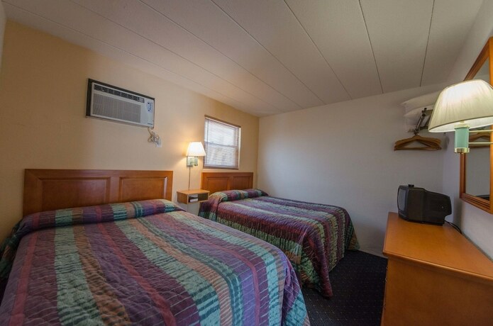 Imagen de la habitación del Hotel Compass Family Resort. Foto 18