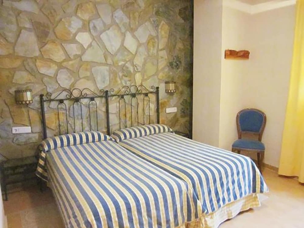 Imagen de la habitación del Hotel Complejo La Villa Don Quijote. Foto 9