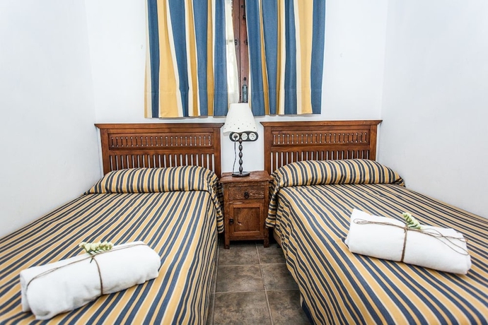 Imagen de la habitación del Hotel Complejo Pequeño Rocío - Hostel. Foto 3