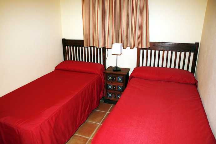 Imagen de la habitación del Hotel Complejo Pequeño Rocío - Hostel. Foto 4