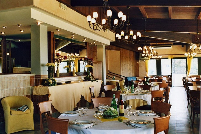Imagen del bar/restaurante del Hotel Complesso L'oasi. Foto 1