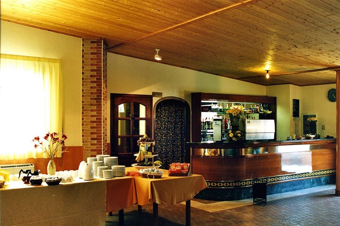 Imagen del bar/restaurante del Hotel Complesso L'oasi. Foto 2