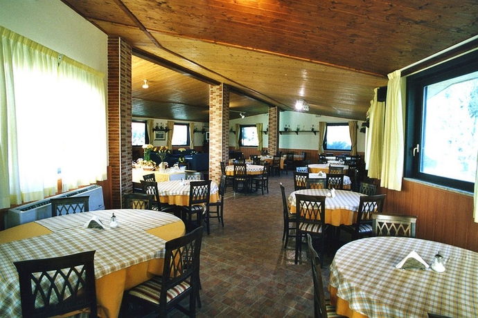 Imagen del bar/restaurante del Hotel Complesso L'oasi. Foto 3