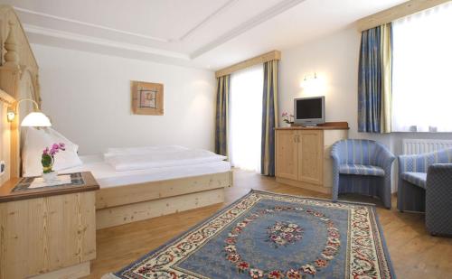 Imagen de la habitación del Hotel Comploj Adults only. Foto 8