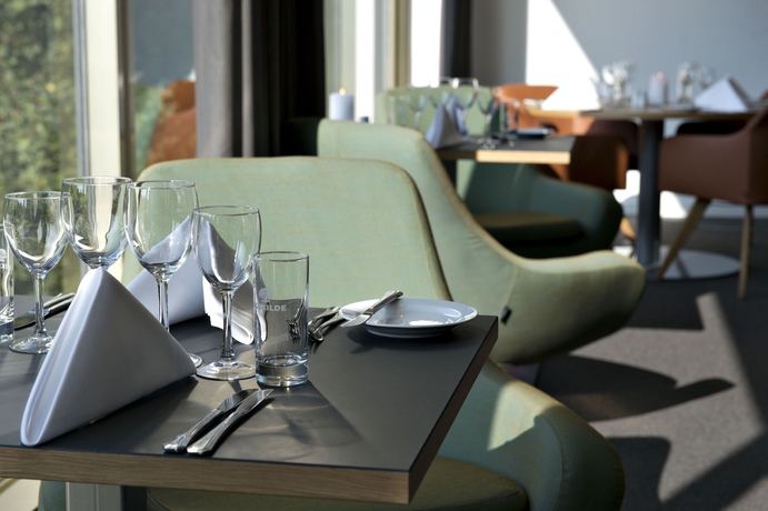 Imagen del bar/restaurante del Hotel Comwell Hvide Hus Aalborg. Foto 3