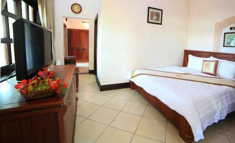 Imagen de la habitación del Hotel Con Ga Vang Resort. Foto 16