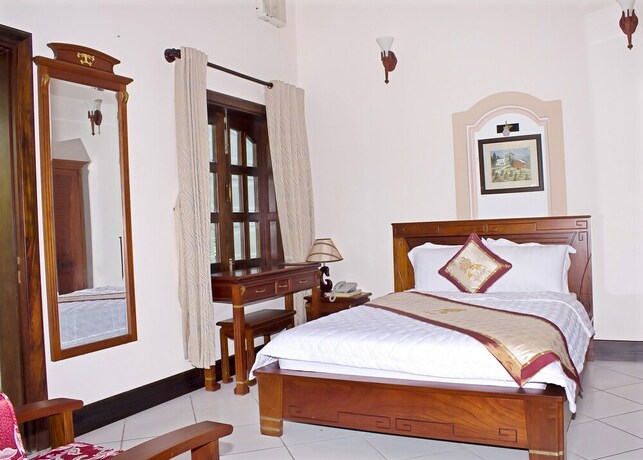 Imagen de la habitación del Hotel Con Ga Vang Resort. Foto 20